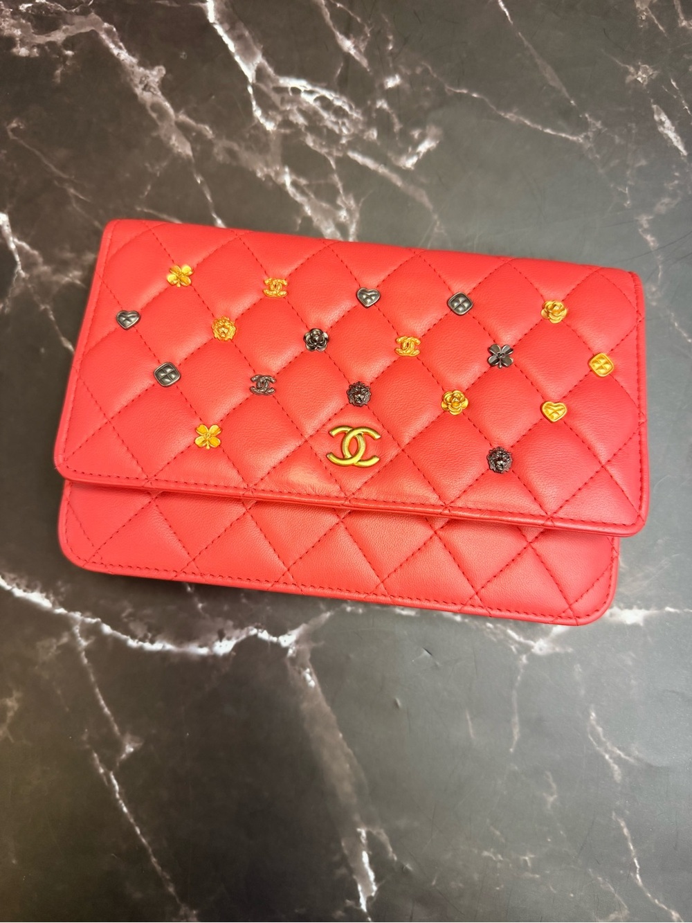 CHANEL Deep Pinky-Coral Quilted Wallet-on-Chain with Mixed Metal Floral Studs